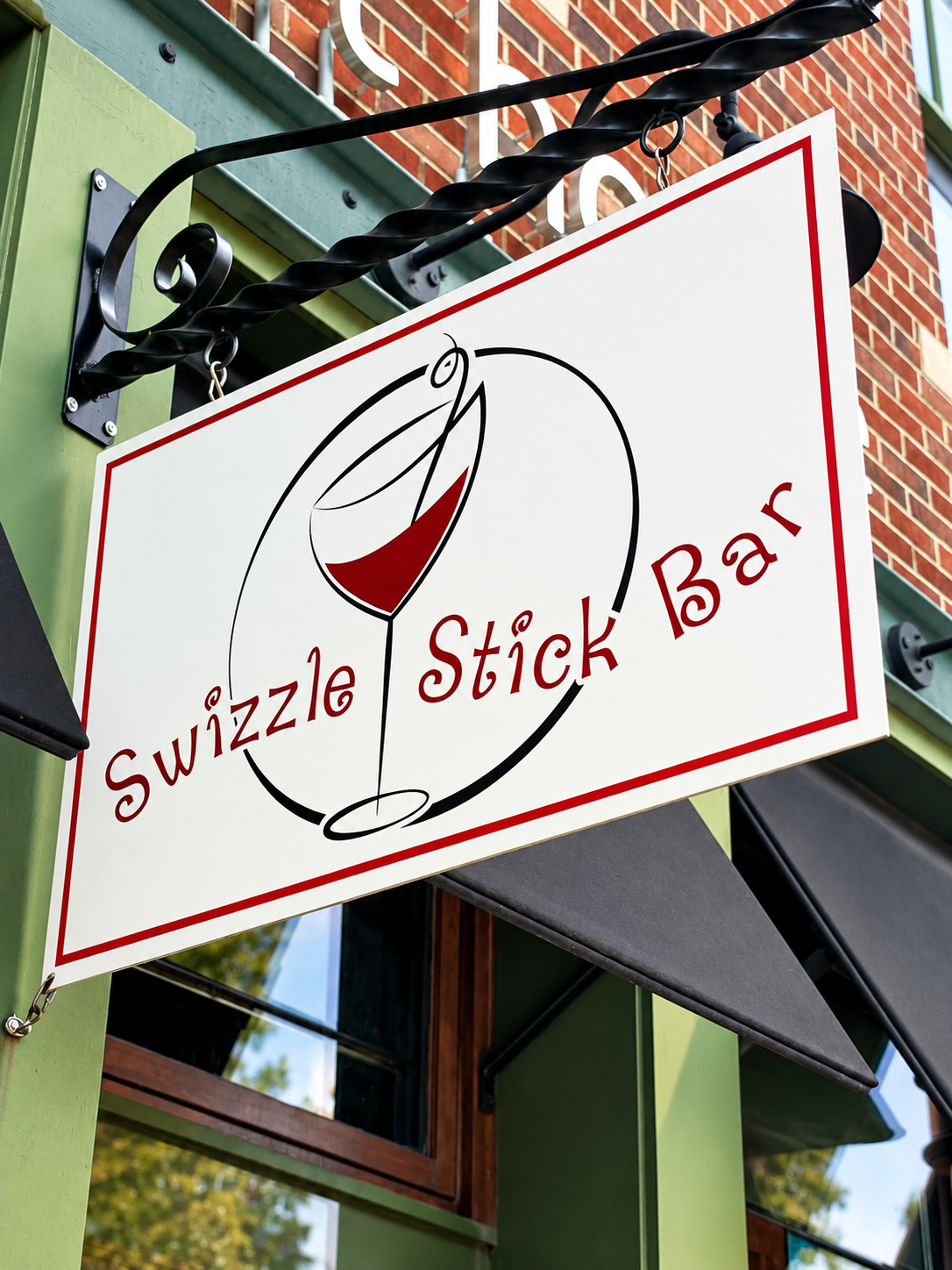 The Swizzle Stick Bar sign outside Almost Home Restaurant